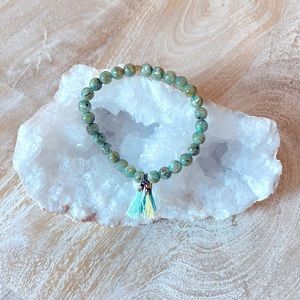 Green moss agate bead and tassel bracelet
